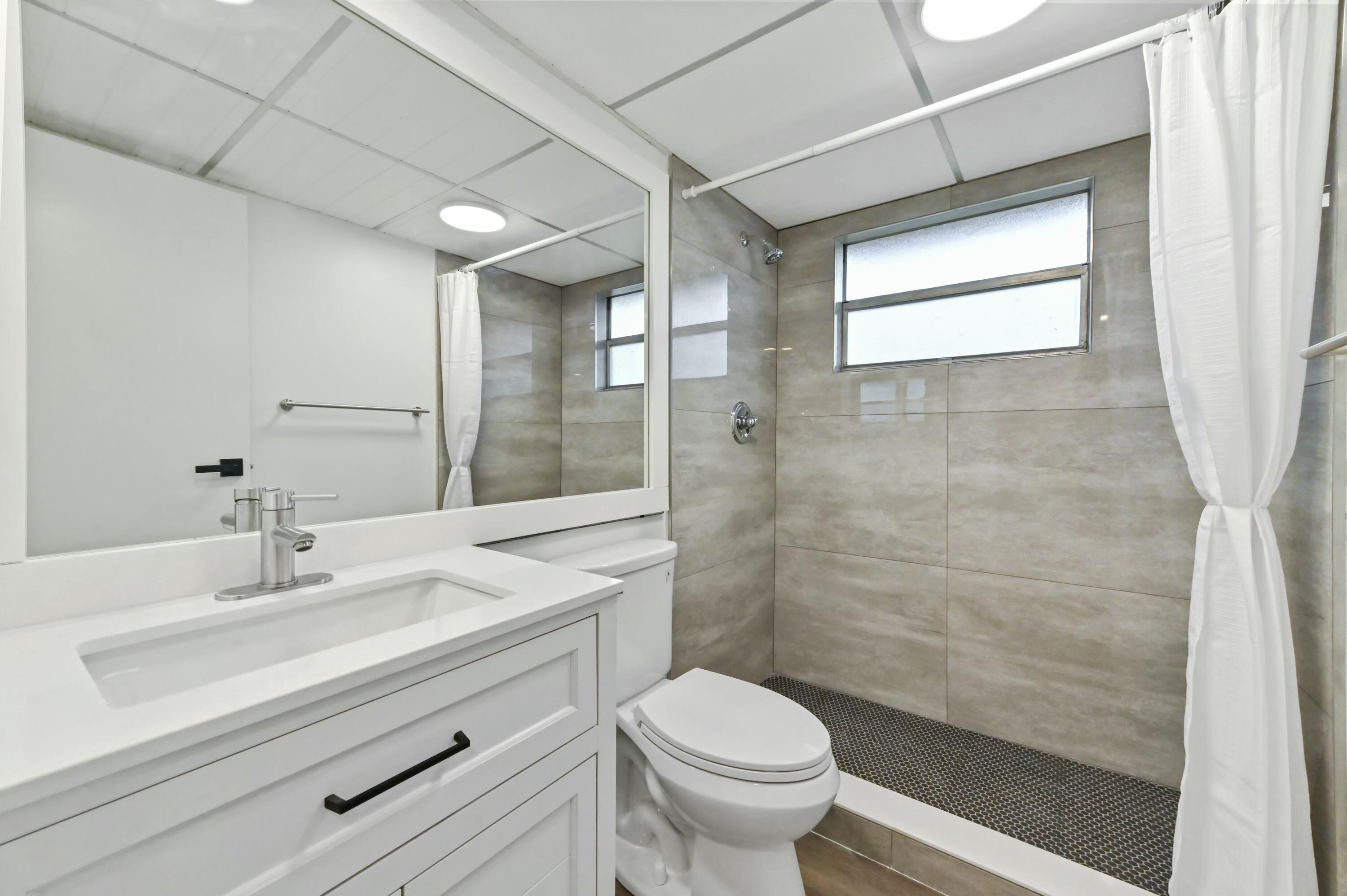 513 Saxony Drive Delray Beach, FL 33446 - Photo 20 of 40 redone shower 2nd bathroom