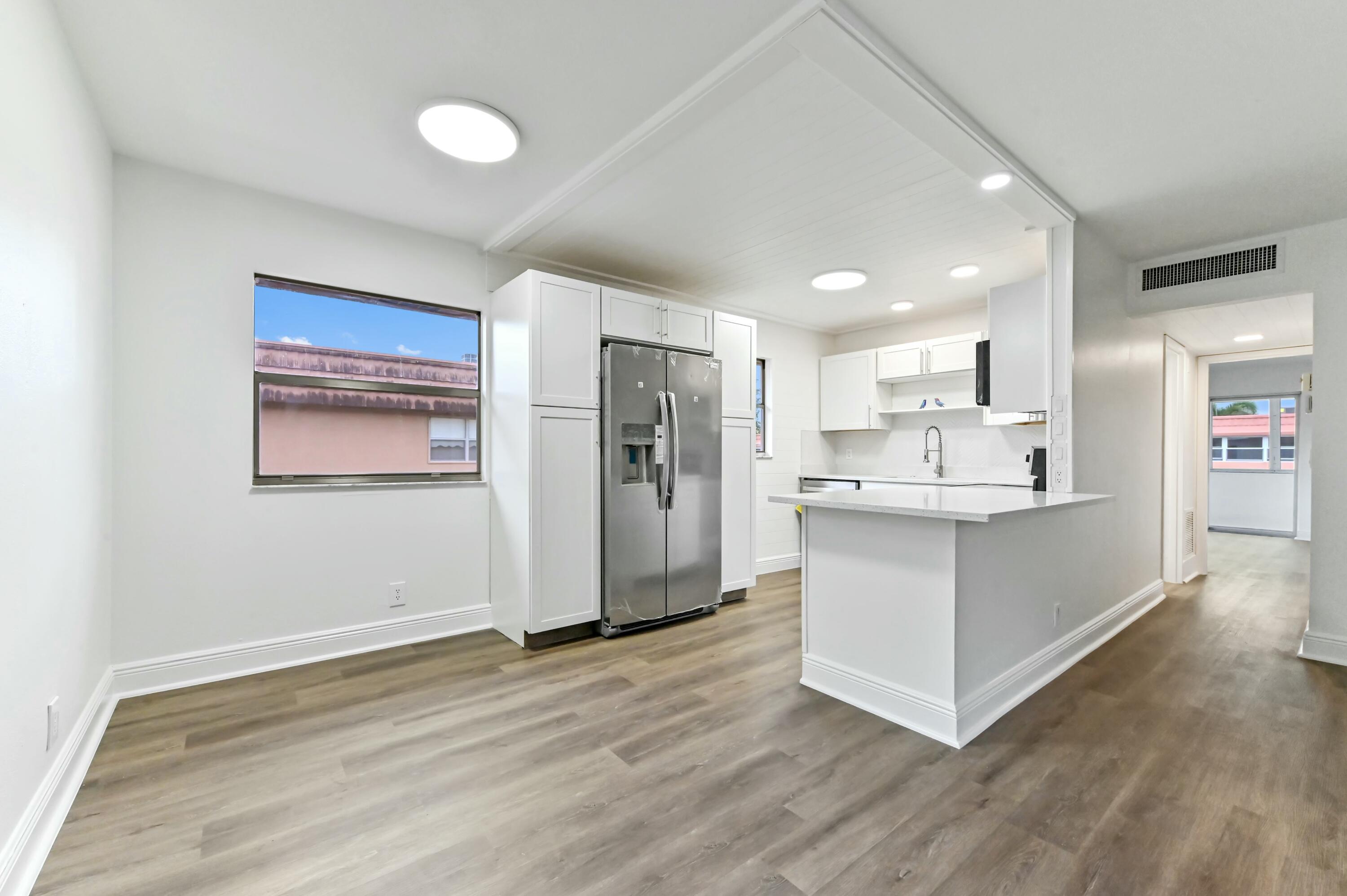 513 Saxony Drive Delray Beach, FL 33446 - Photo 2 of 40 open concept remodeled kitchen