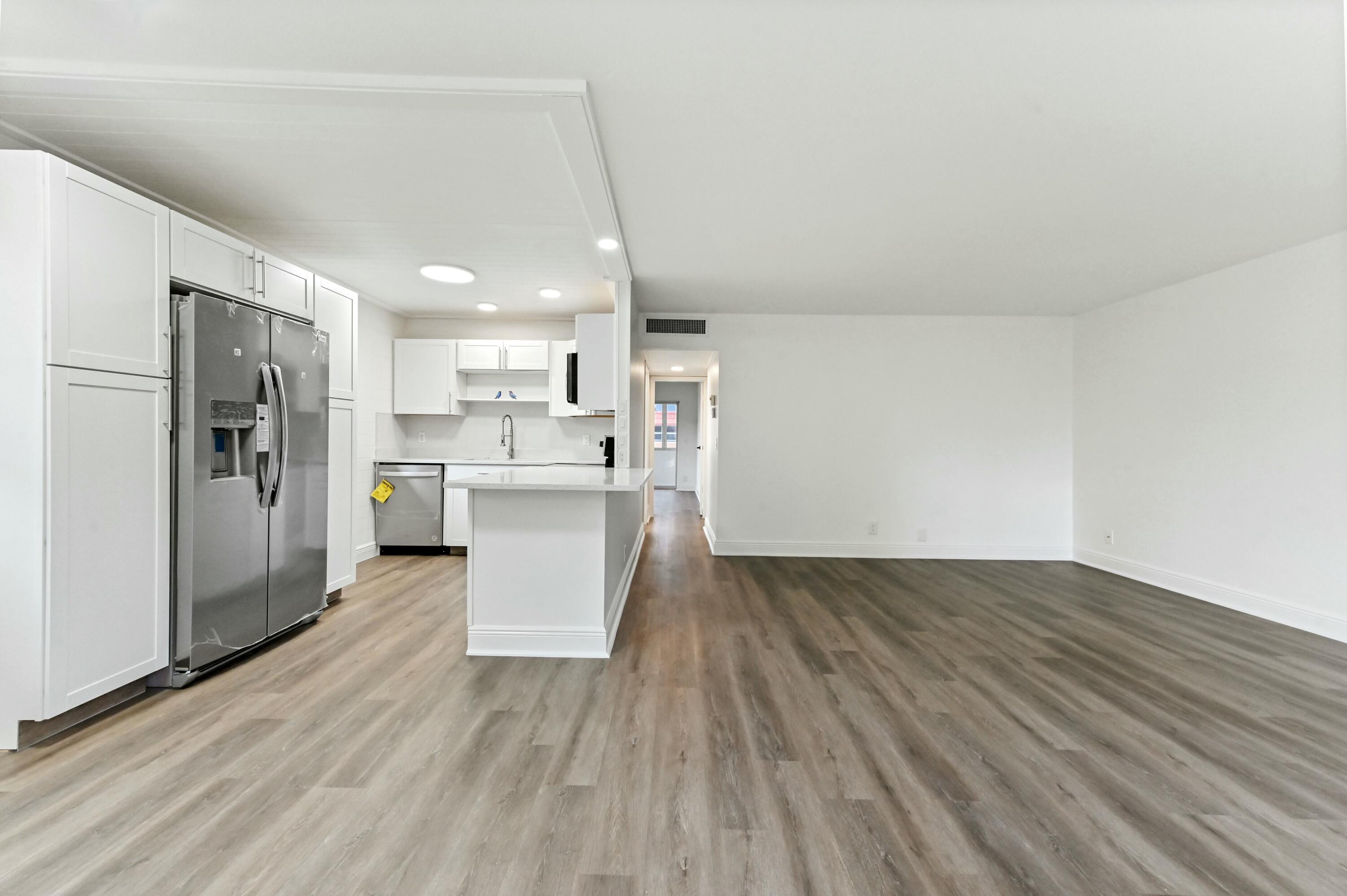 513 Saxony Drive Delray Beach, FL 33446 - Photo 4 of 40 new vinyl flooring