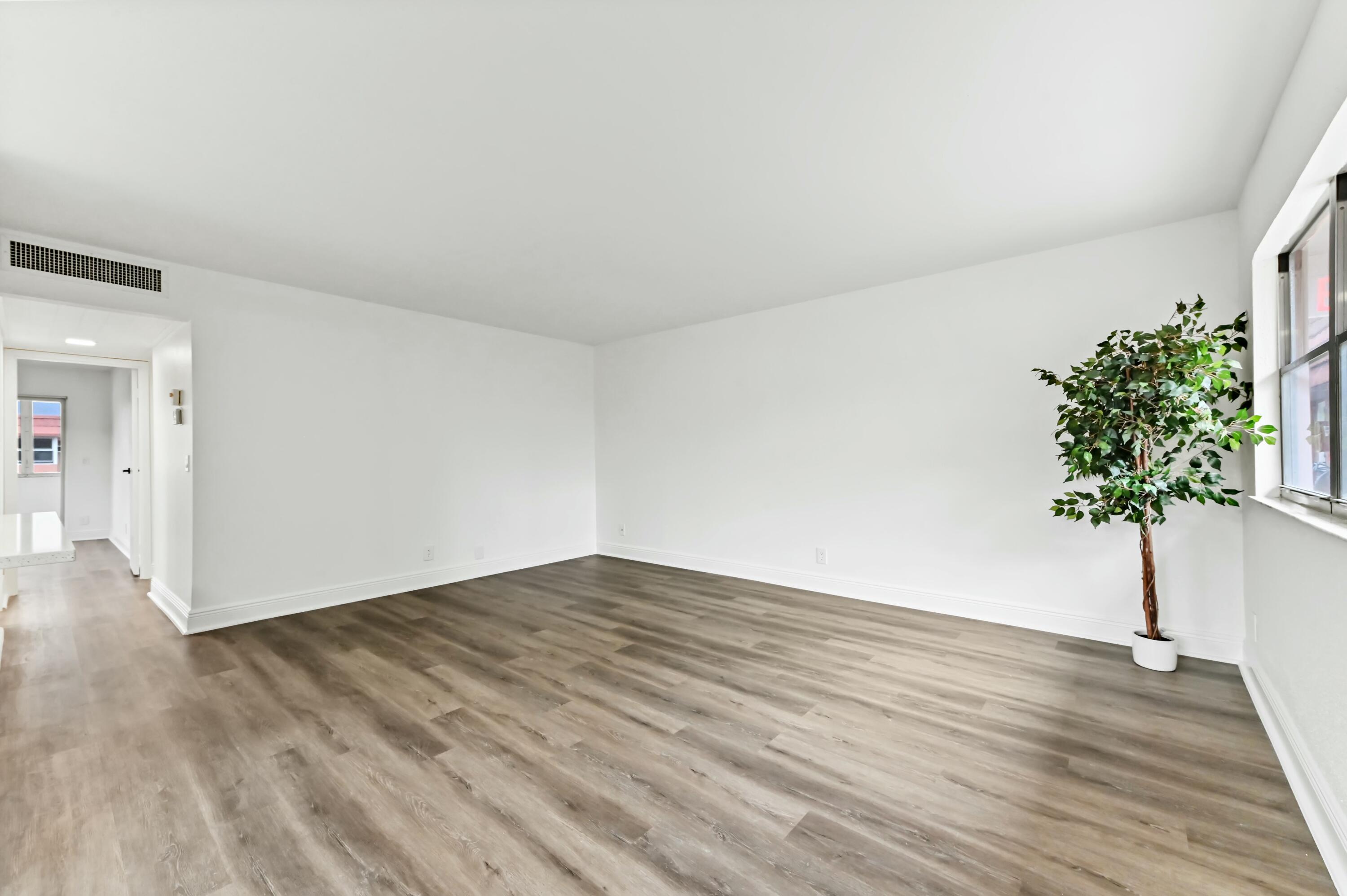 513 Saxony Drive Delray Beach, FL 33446 - Photo 5 of 40 new vinyl flooring