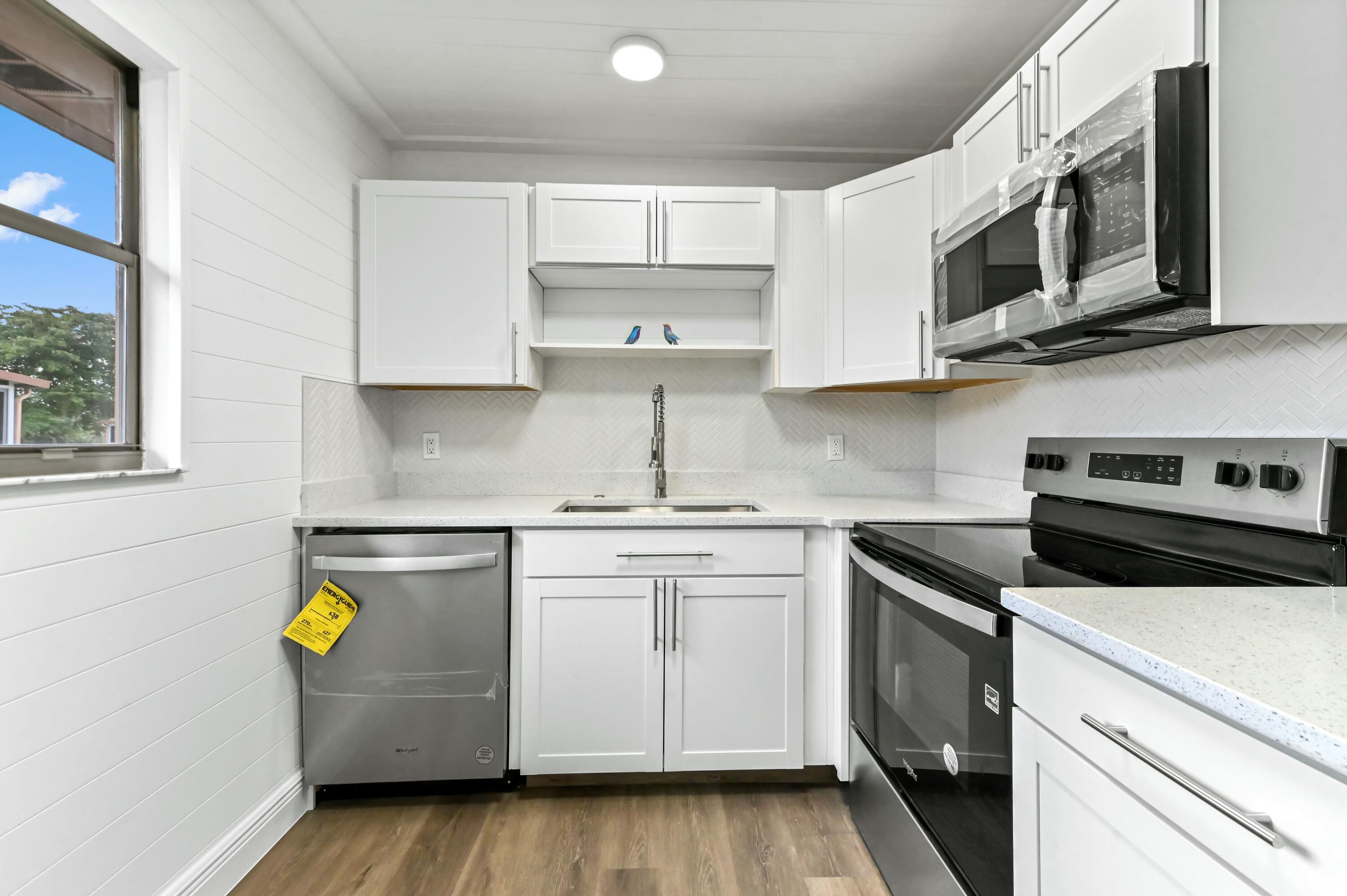 513 Saxony Drive Delray Beach, FL 33446 - Photo 10 of 40 white panel accent wall