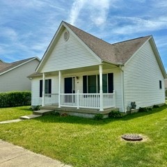1119 Whitaker Street Normal, IL 61761 - Photo 1 of 3 a view of a house with a backyard