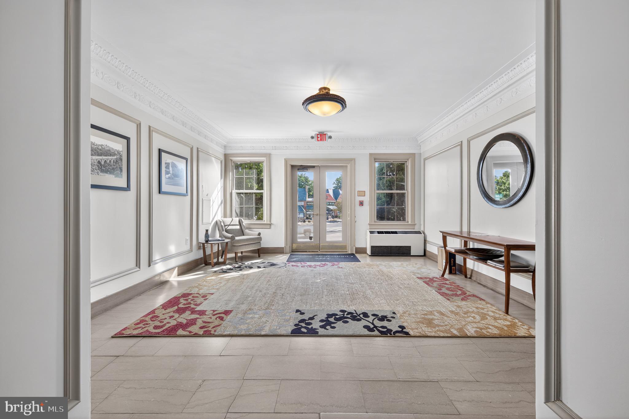 3446 Connecticut Avenue Northwest, Unit 305 Washington, DC 20008 - Photo 2 of 15 a view of a livingroom with wooden floor and furniture