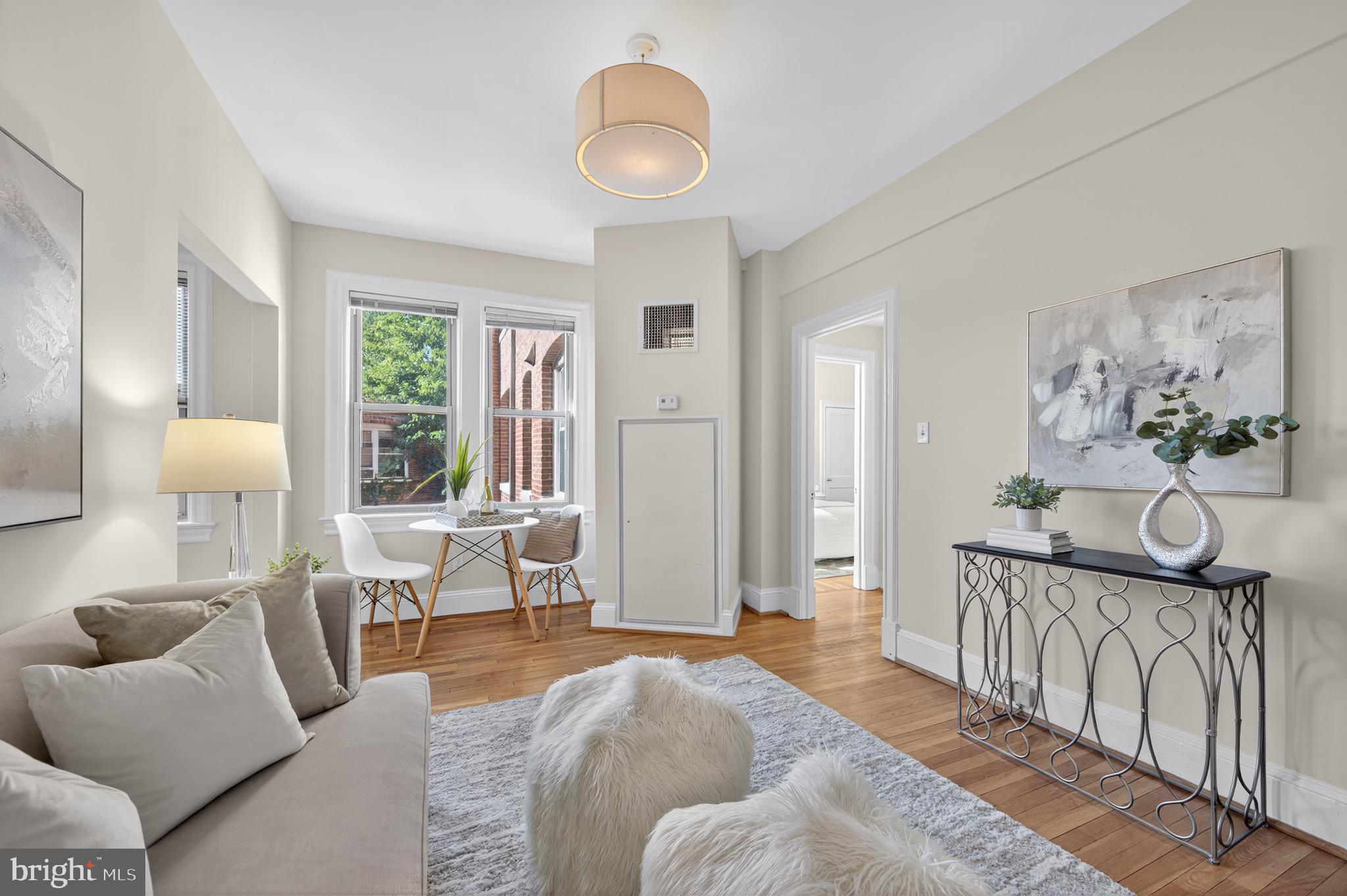 3446 Connecticut Avenue Northwest, Unit 305 Washington, DC 20008 - Photo 5 of 15 a spacious bedroom with furniture and a window