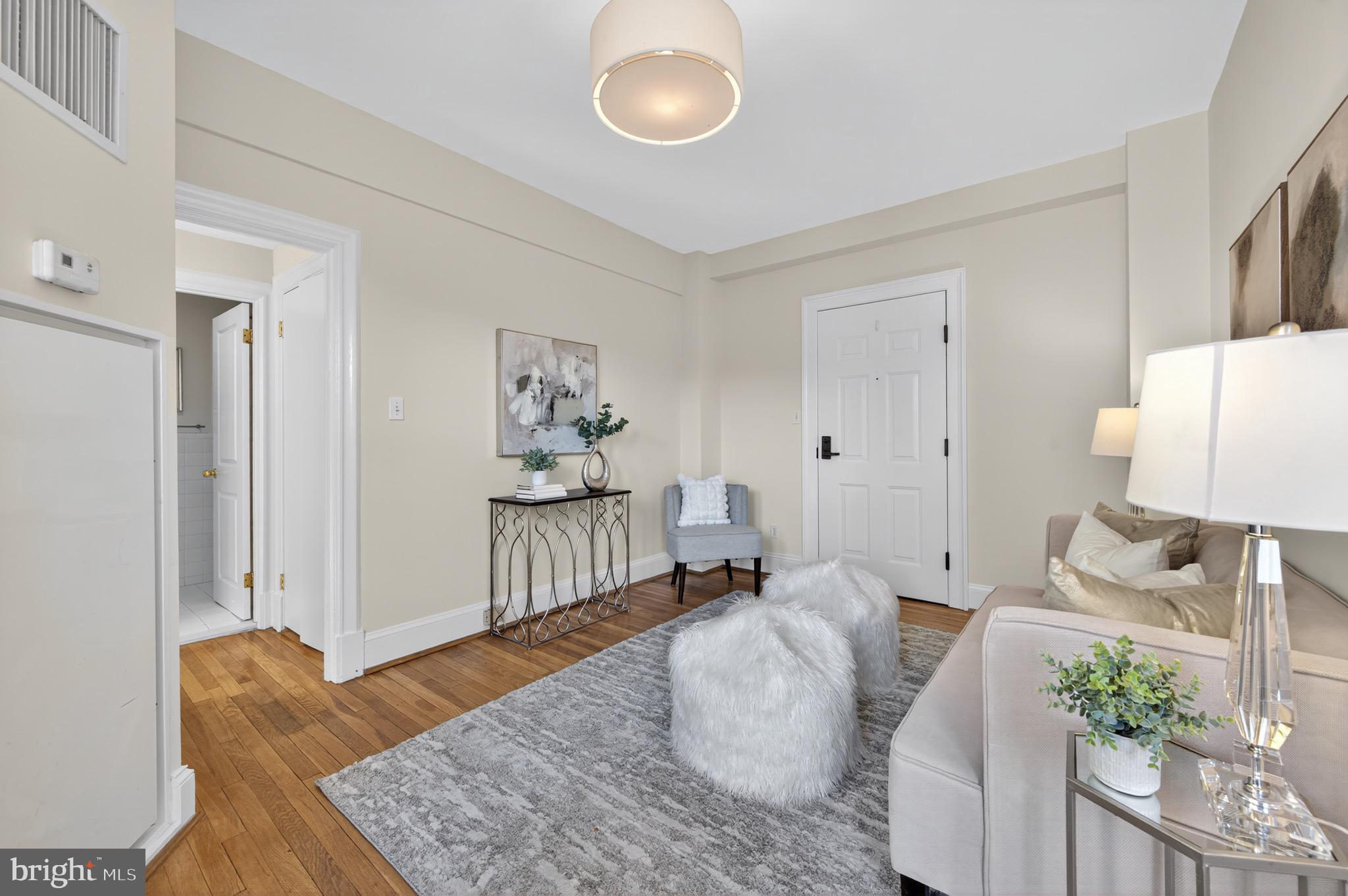 3446 Connecticut Avenue Northwest, Unit 305 Washington, DC 20008 - Photo 6 of 15 a living room with furniture