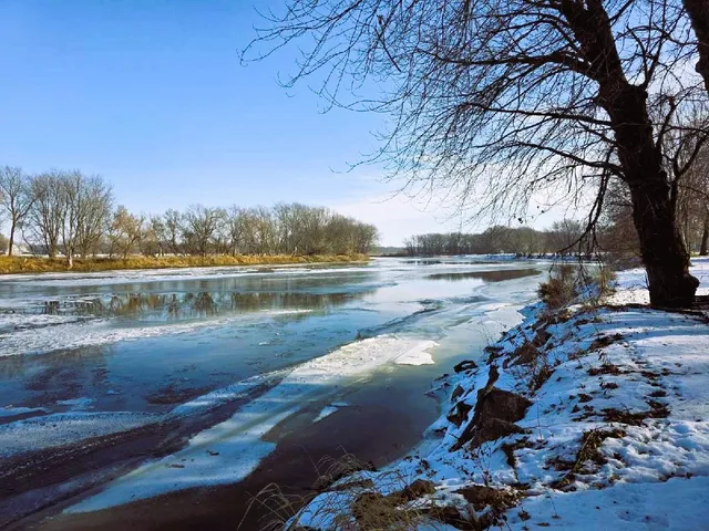 a view of lake with green space