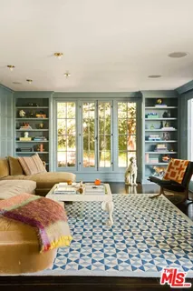 a kitchen with stainless steel appliances granite countertop a stove and a wooden floors