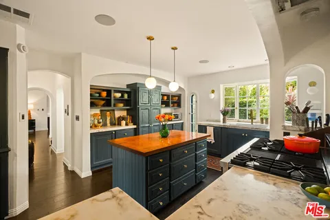 a dining room with furniture window and outdoor view