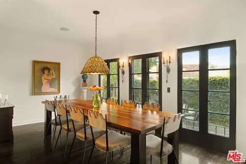 a workspace with furniture and a potted plant