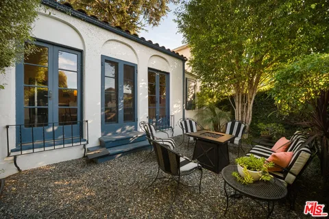 a view of a balcony with wooden floor