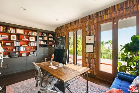 a bathroom with a sink a vanity and a bathtub
