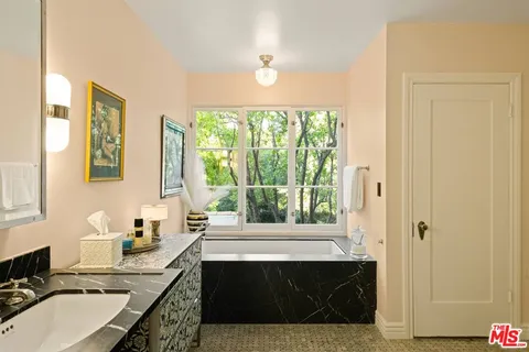 a view of a chairs and tables in the patio