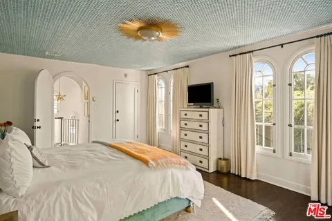 a view of a balcony with plants