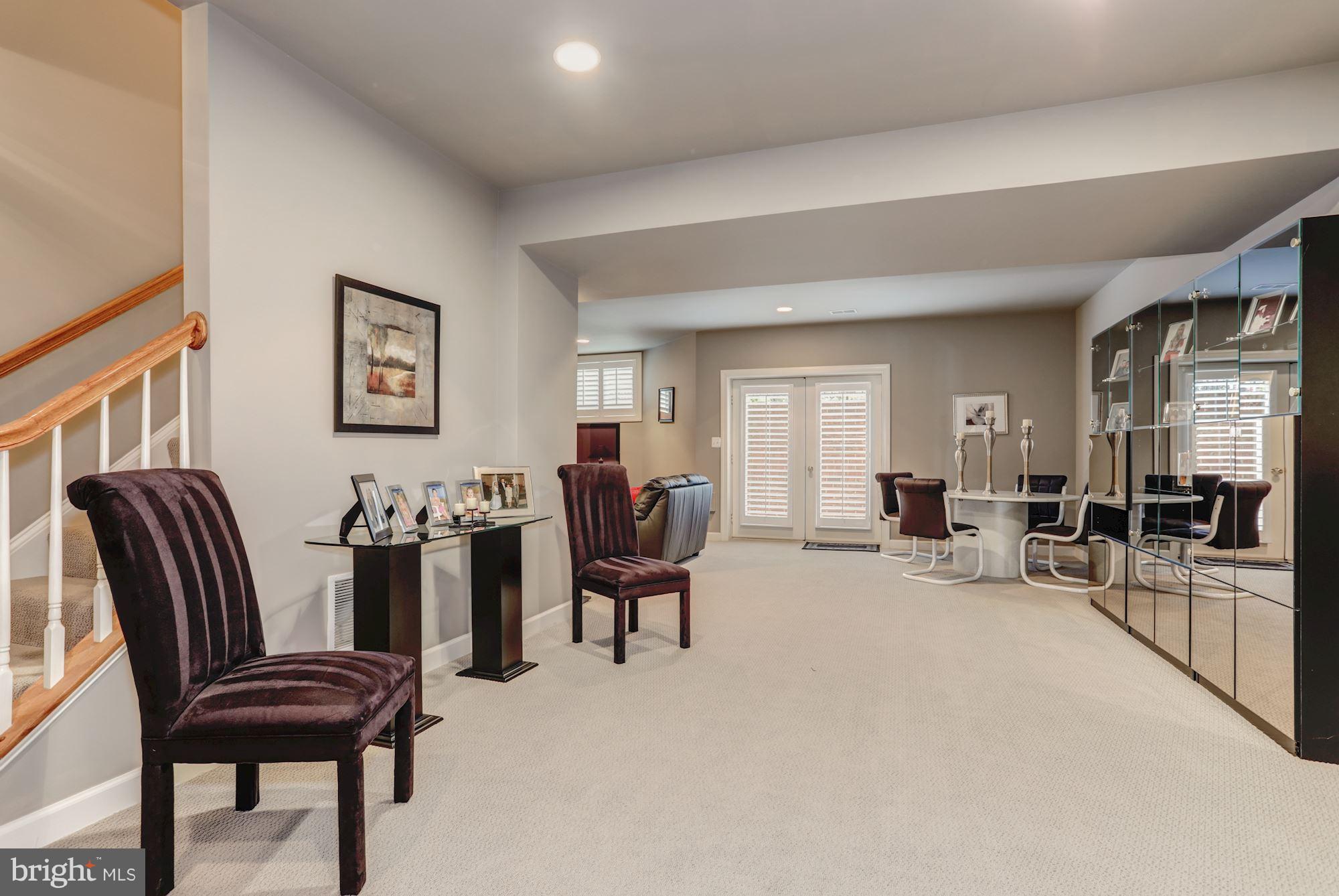 8317 Roxborough Loop Gainesville, VA 20155 - Photo 28 of 32 Walk-Out Lower Level Recreation Room