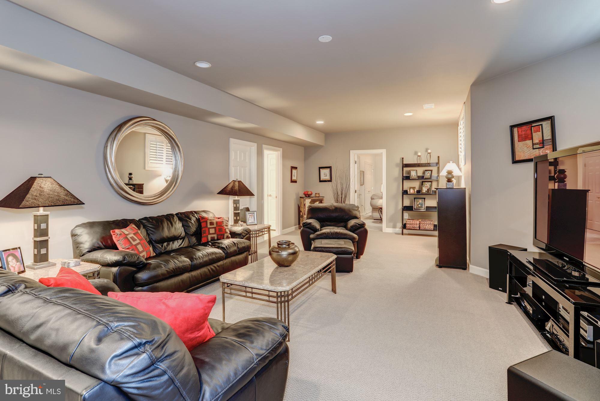 8317 Roxborough Loop Gainesville, VA 20155 - Photo 29 of 32 Walk-Out Lower Level Recreation Room