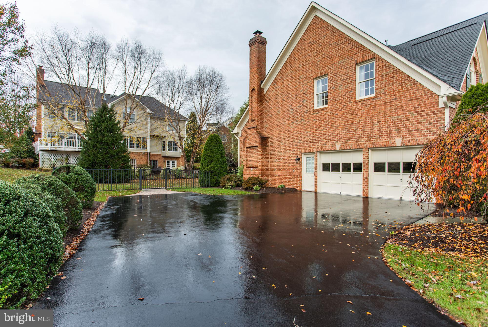 8317 Roxborough Loop Gainesville, VA 20155 - Photo 32 of 32 Two Car Garage and Driveway