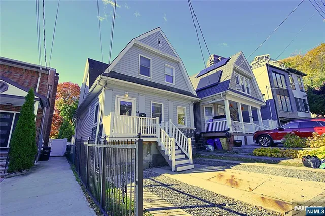 a view of a house with swimming pool