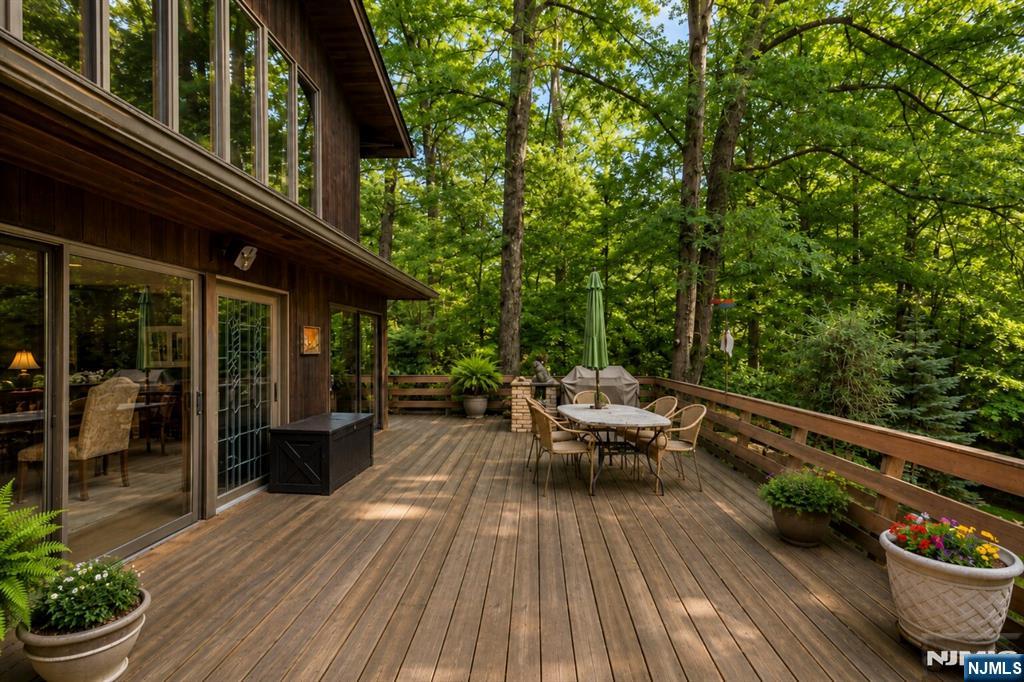 34 Cambridge Way Alpine, NJ 07620 - Photo 38 of 48 a view of a patio with chairs and plants