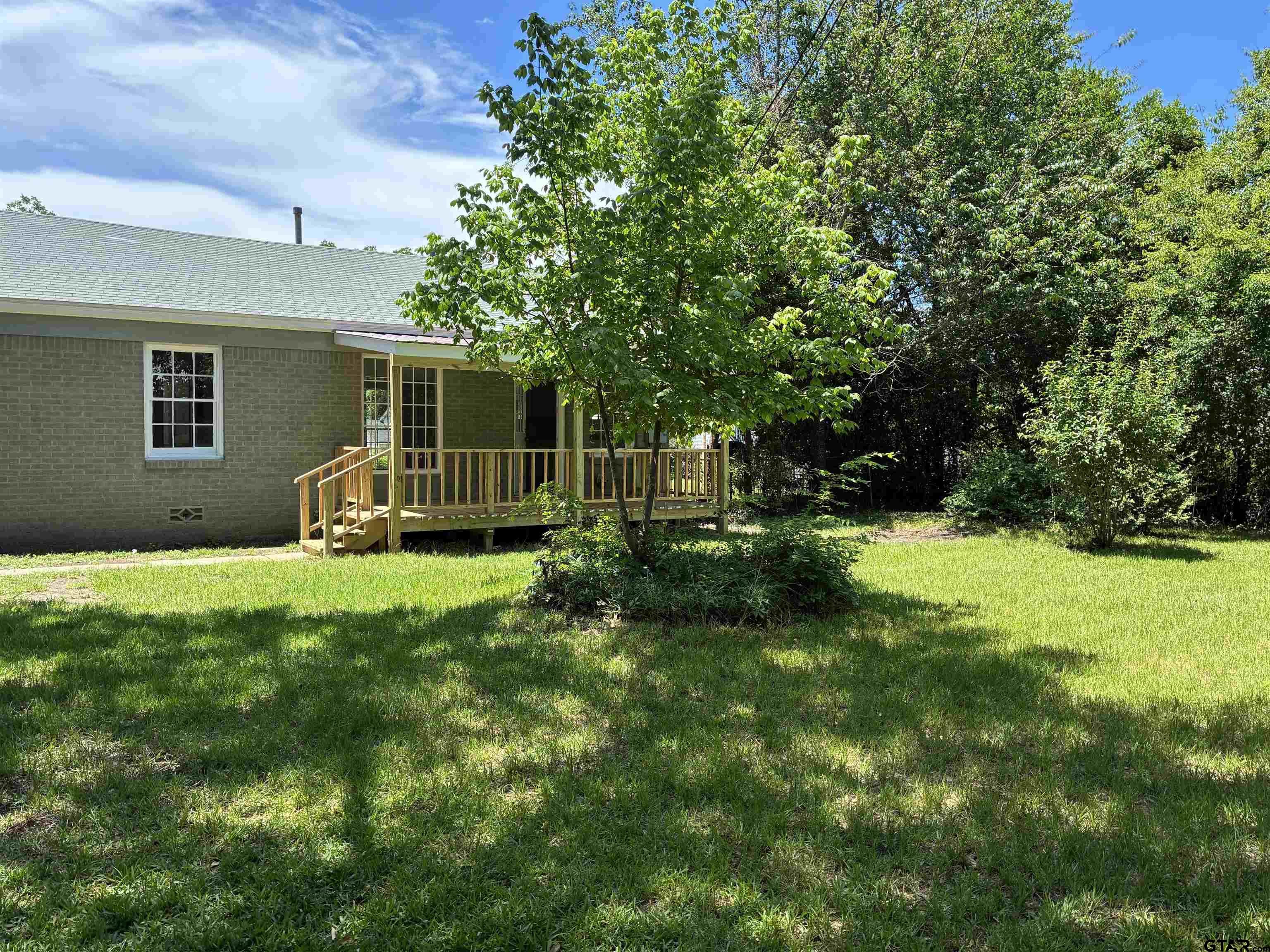 811 West 5th Street Tyler, TX 75701 - Photo 23 of 26 a front view of a house with garden