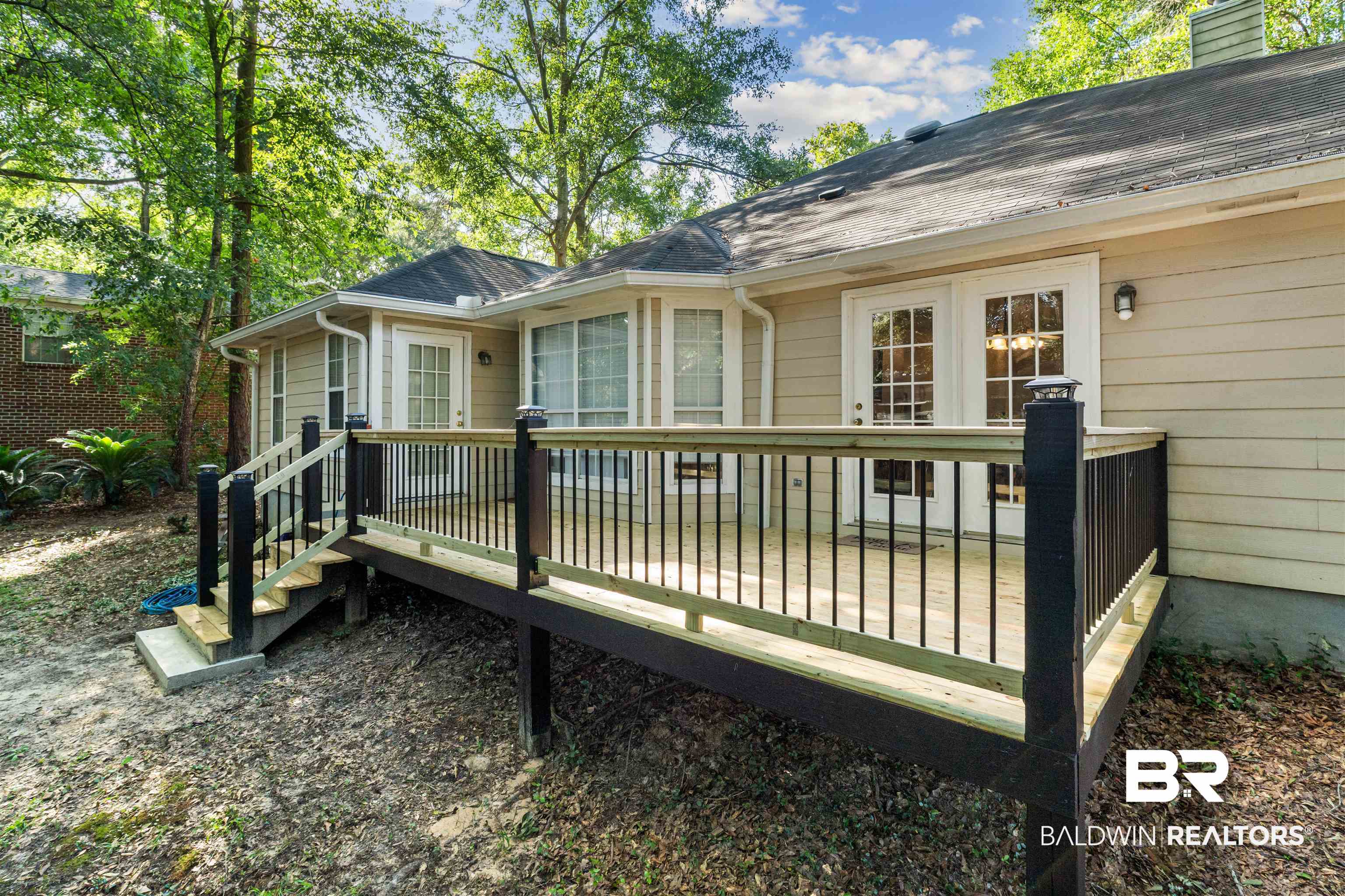 153 Lakeview Loop Daphne, AL 36526 - Photo 49 of 56 With plenty of room for seating and outdoor dining, this space is designed to bring people together.