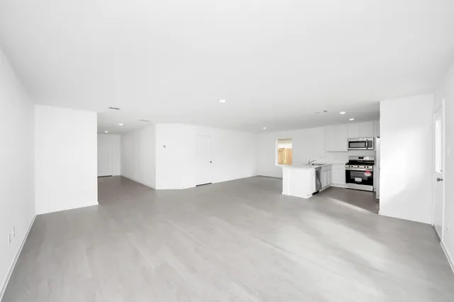 a view of a livingroom with a furniture