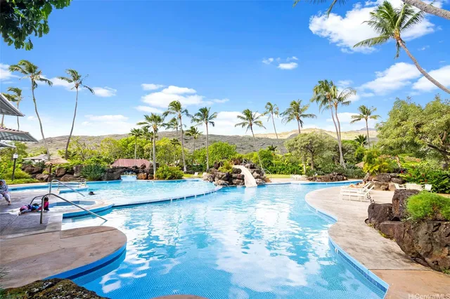 a view of a swimming pool and a fountain