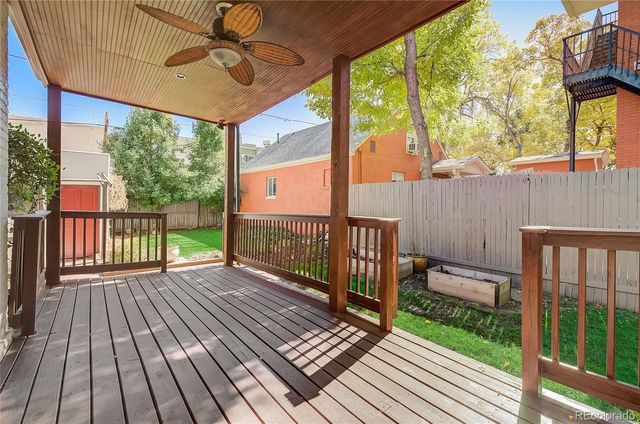 a view of a two chairs in the balcony