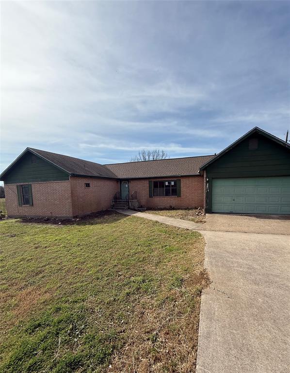 104 Lilly Street Kosse, TX 76653 - Photo 1 of 15 a view of a backyard