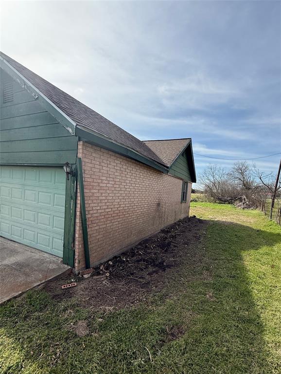 104 Lilly Street Kosse, TX 76653 - Photo 2 of 15 a backyard of a house