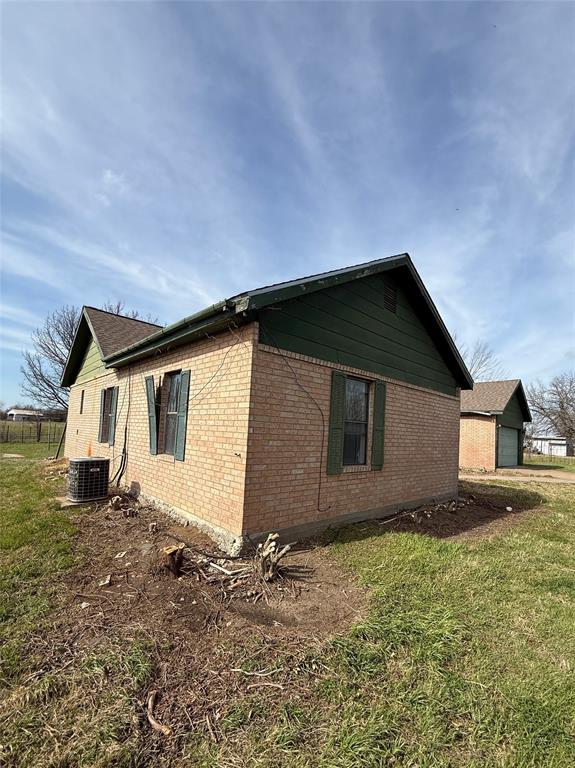 104 Lilly Street Kosse, TX 76653 - Photo 5 of 15 a house with yard