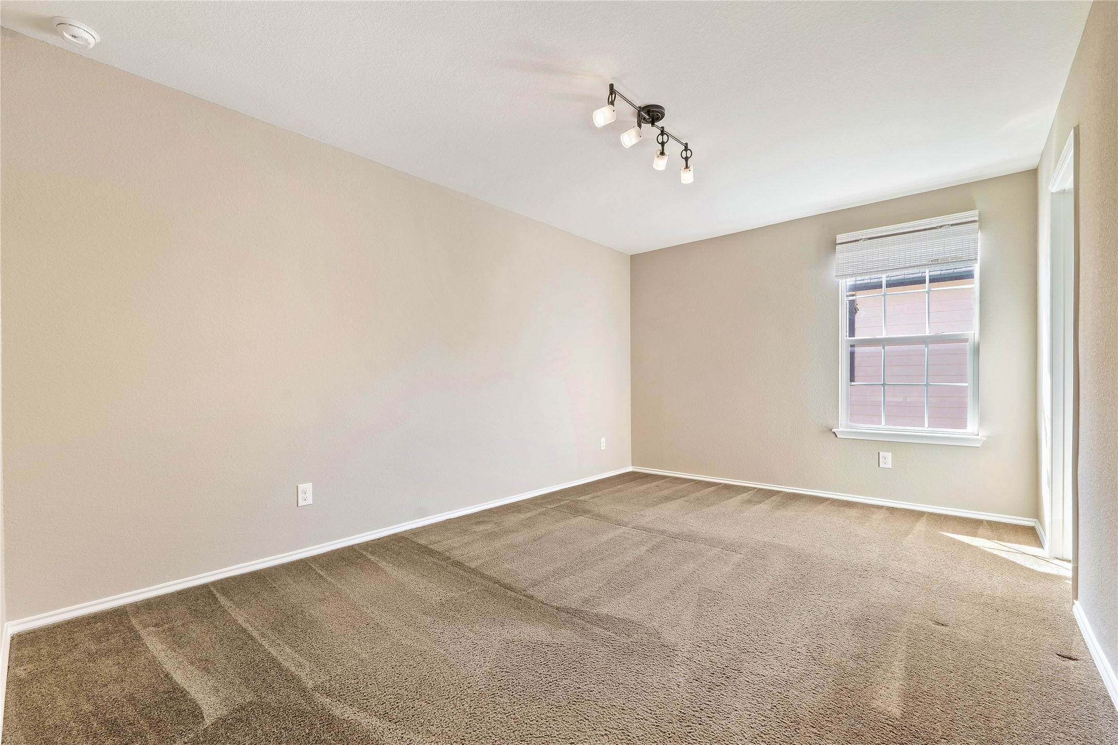 207 Telluride Drive Georgetown, TX 78626 - Photo 24 of 40 Bedroom #4 featuring carpet flooring and baseboards