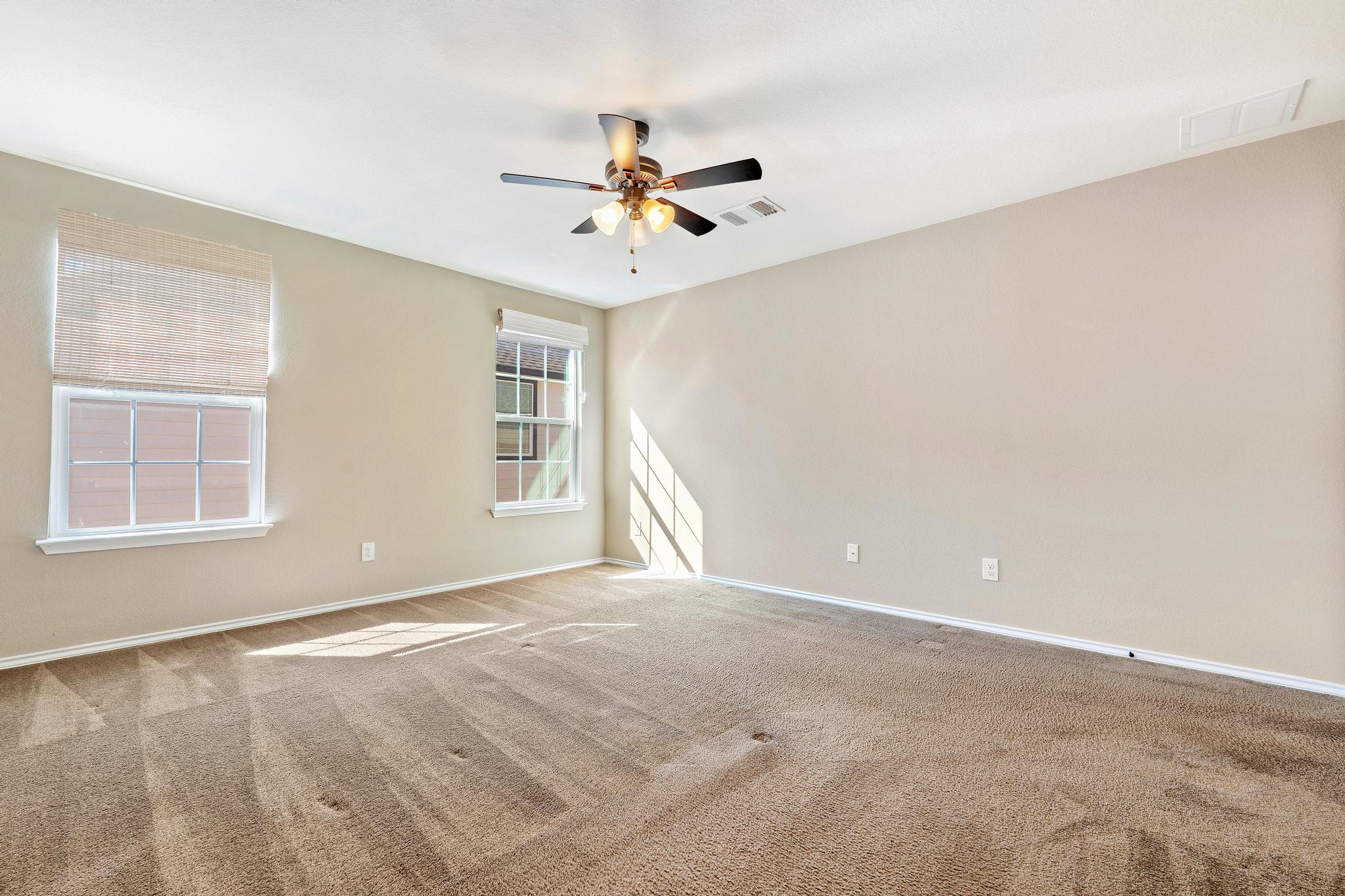 207 Telluride Drive Georgetown, TX 78626 - Photo 28 of 40 Bedroom #5 with a ceiling fan and carpet flooring