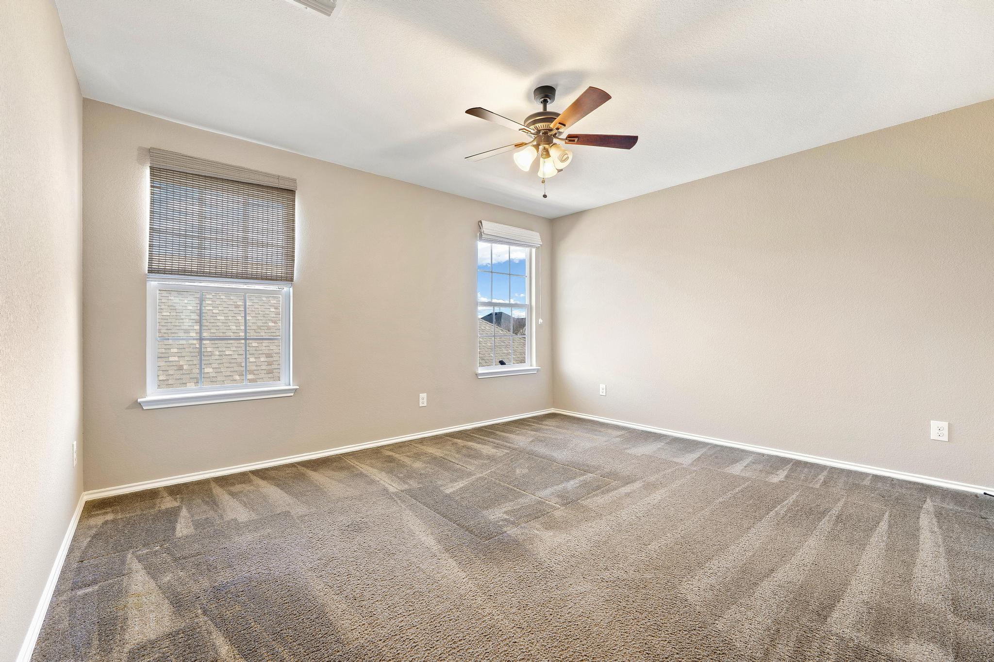 207 Telluride Drive Georgetown, TX 78626 - Photo 31 of 40 Bedroom #6 featuring ceiling fan and carpet floors