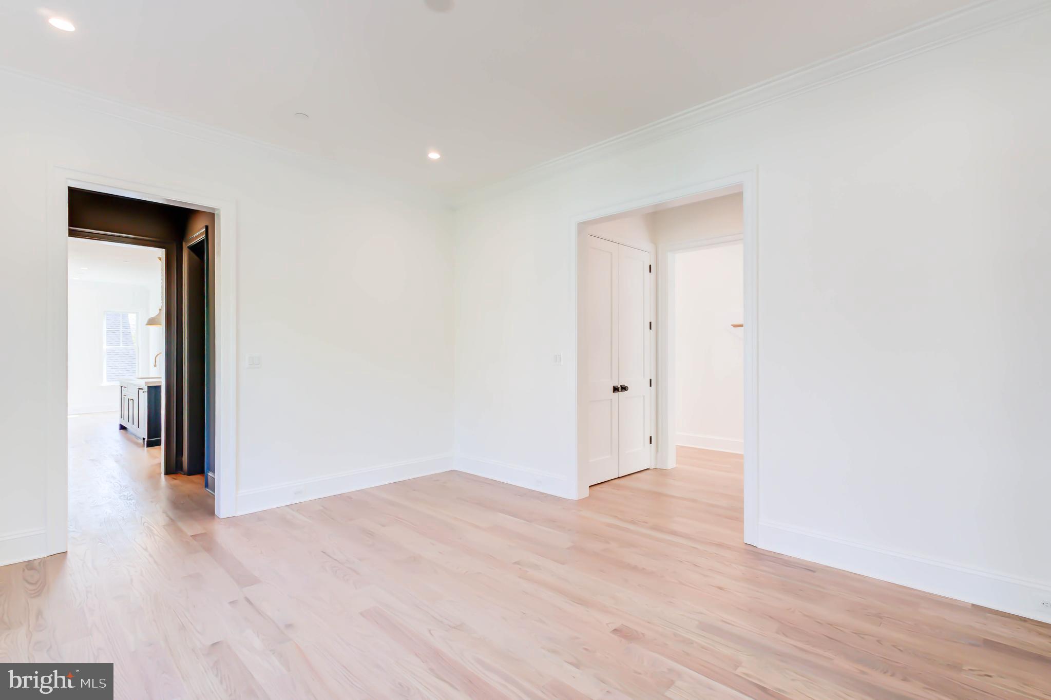 3118 Patterson Street Northwest Washington, DC 20015 - Photo 13 of 79 a view of an empty room with wooden floor