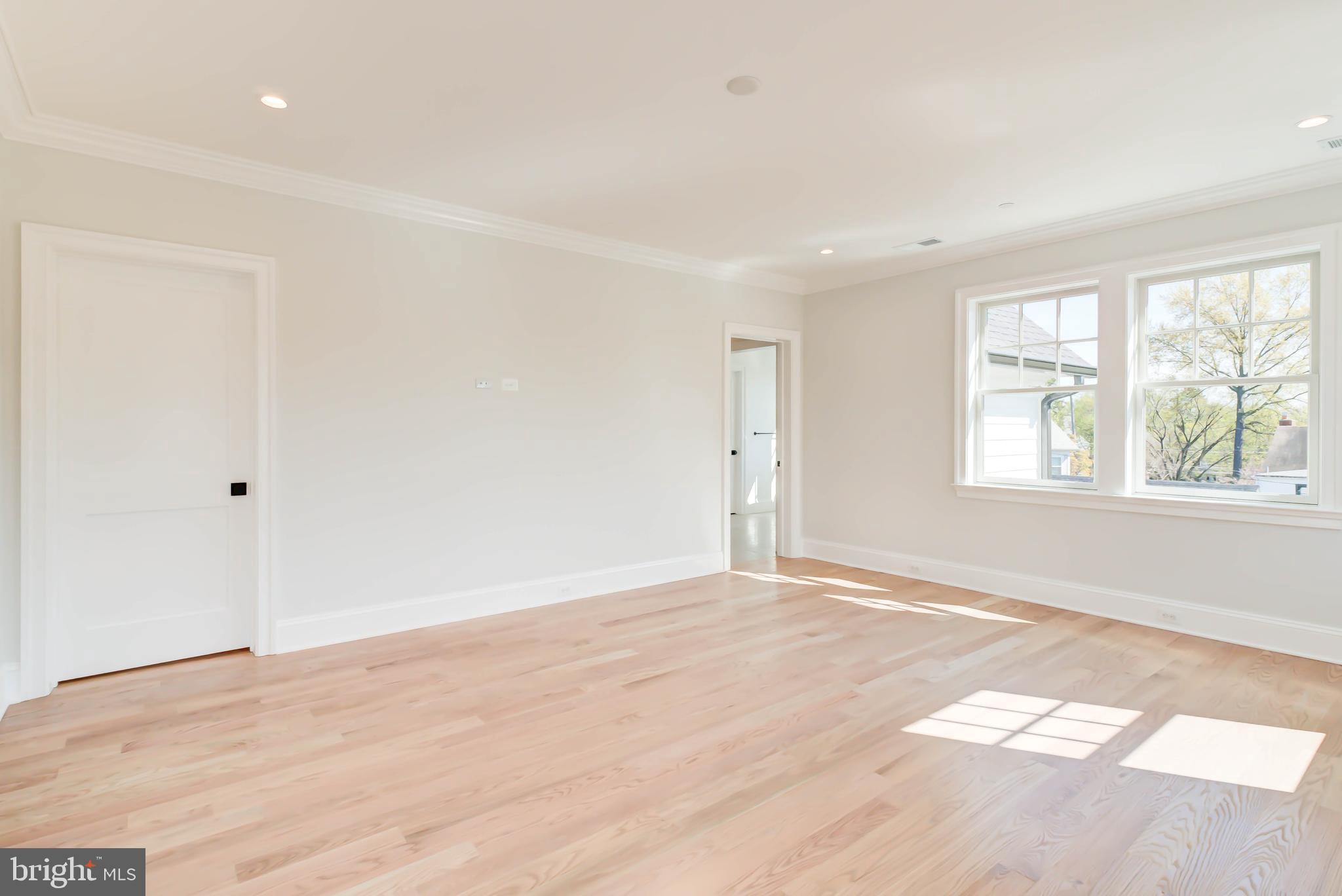 3118 Patterson Street Northwest Washington, DC 20015 - Photo 36 of 79 wooden floor in an empty room with a window