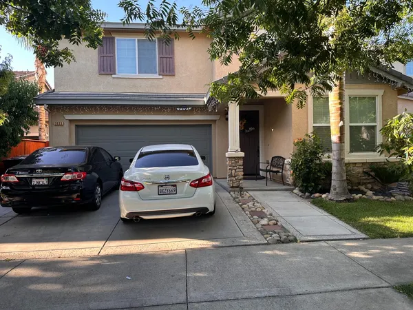 a car parked in front of a house