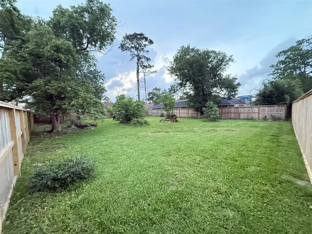 a view of a backyard with a garden