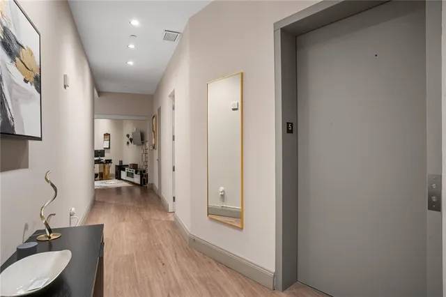 a very nice looking room with wooden floor