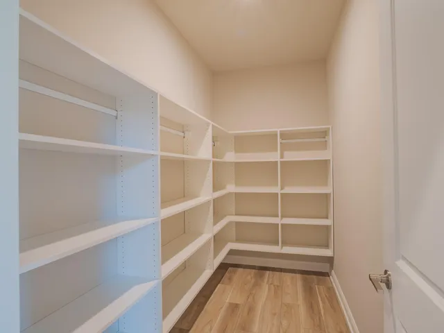 a bathroom with a sink and vanity