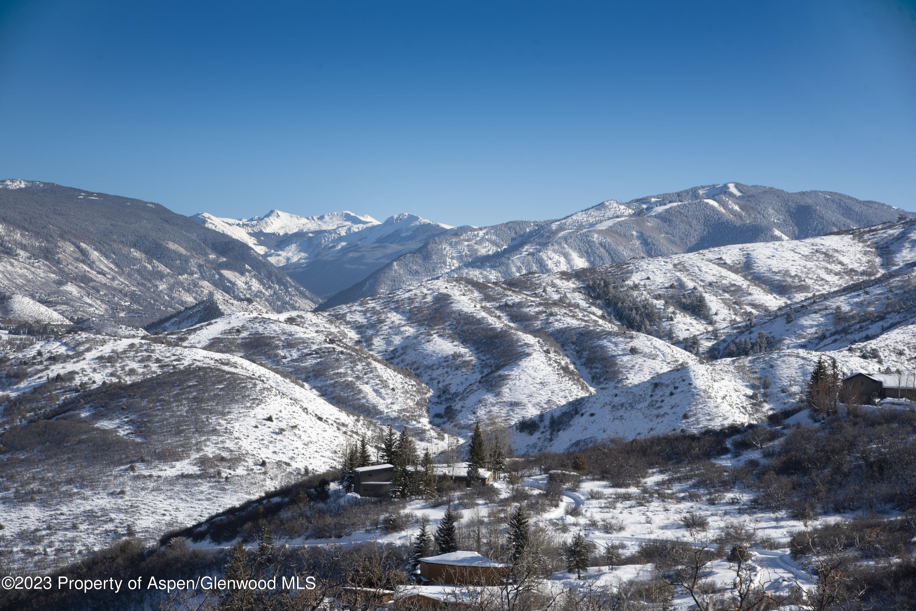 54 Red Tail Lane Aspen, CO 81611 - Photo 6 of 15 a view of a backyard of the house