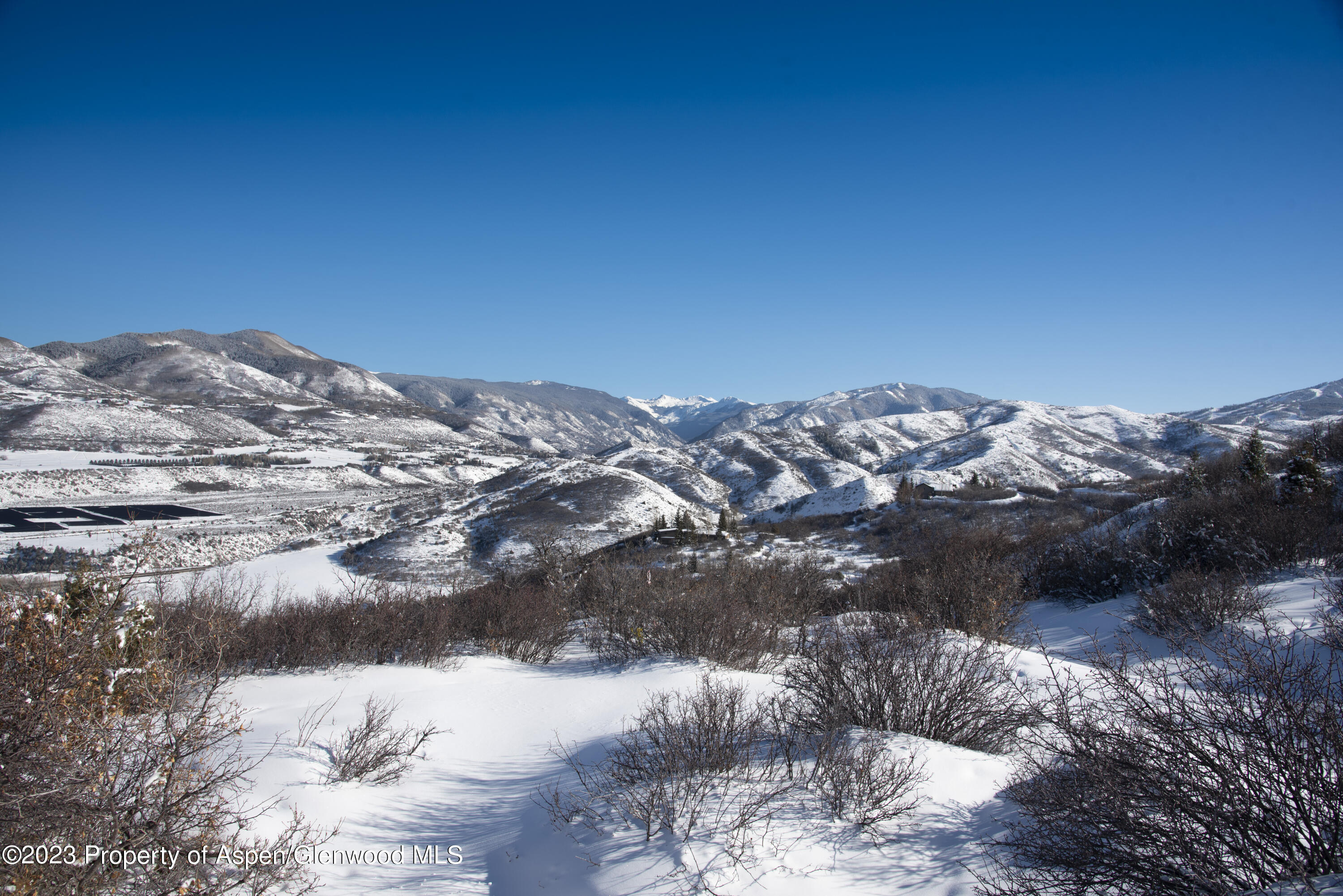 54 Red Tail Lane Aspen, CO 81611 - Photo 7 of 15 a view of a lake with a mountain