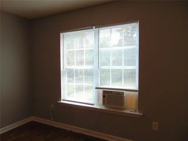 a view of a room that has a window in it