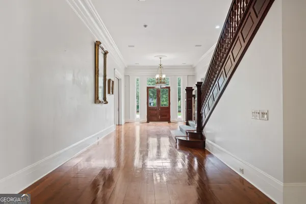 a kitchen with stainless steel appliances granite countertop a sink and cabinets