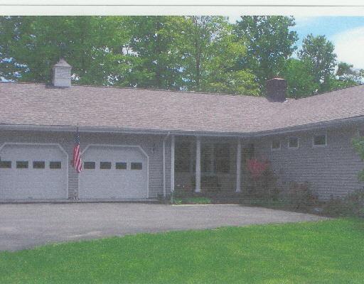 5 Reservoir Road Newtown, CT 06470 - Photo 1 of 1 a view of front of house with a yard