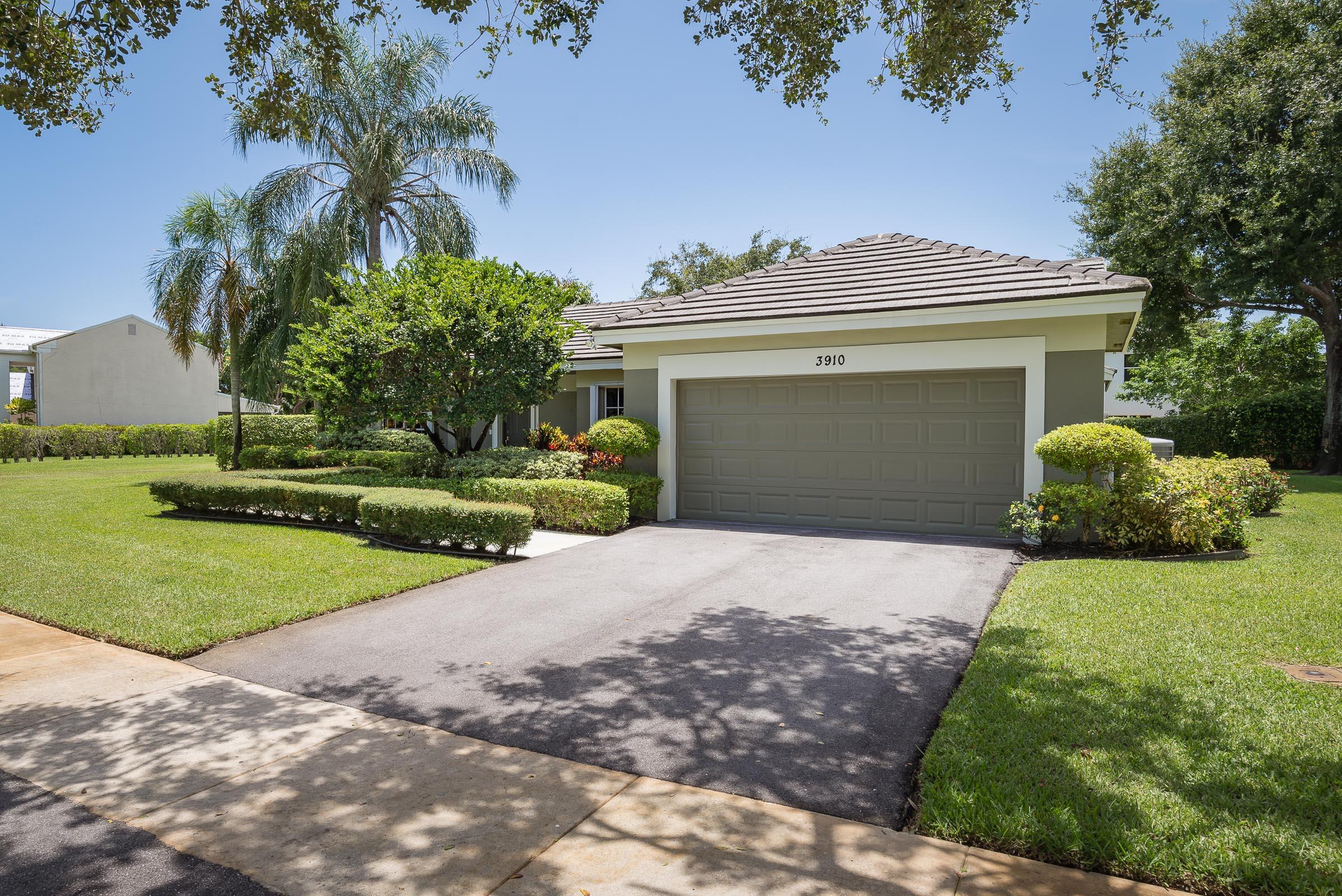 3910 Sabal Lakes Road Delray Beach, FL 33445 - Photo 3 of 37 FRONT OF HOUSE