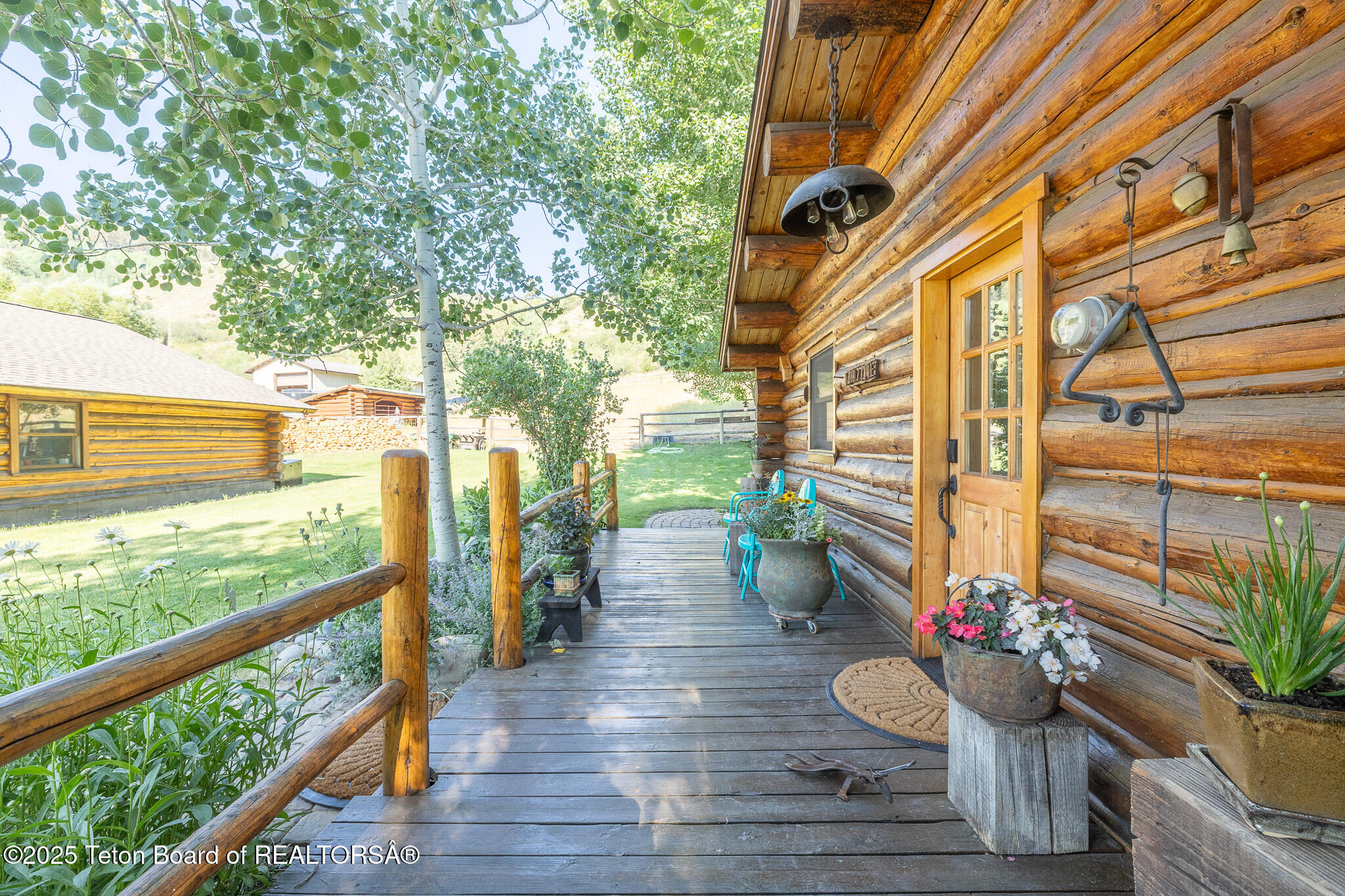 9375 Cole Canyon Road Jackson, WY 83001 - Photo 33 of 39 Front door/deck