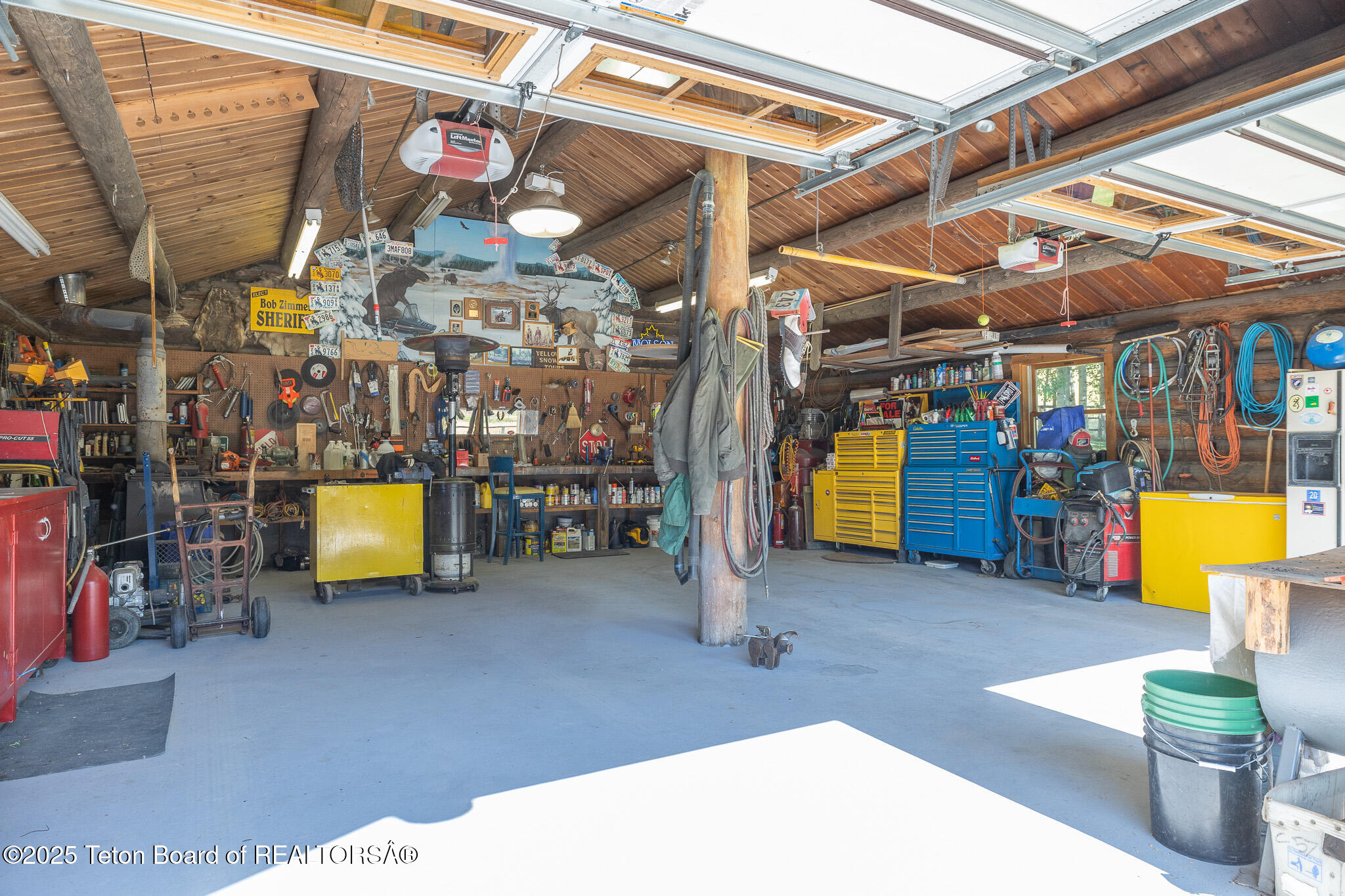 9375 Cole Canyon Road Jackson, WY 83001 - Photo 39 of 39 Garage interior with woodstove