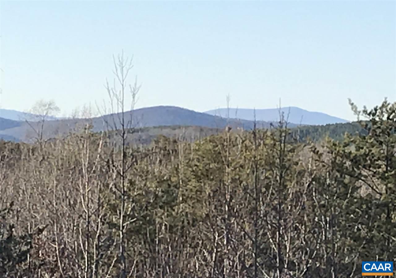 6845 Cabell Road Howardsville, VA 24562 - Photo 13 of 49 a view of a dry yard with mountains in the background