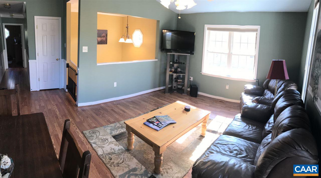 6845 Cabell Road Howardsville, VA 24562 - Photo 19 of 49 a living room with furniture and a flat screen tv