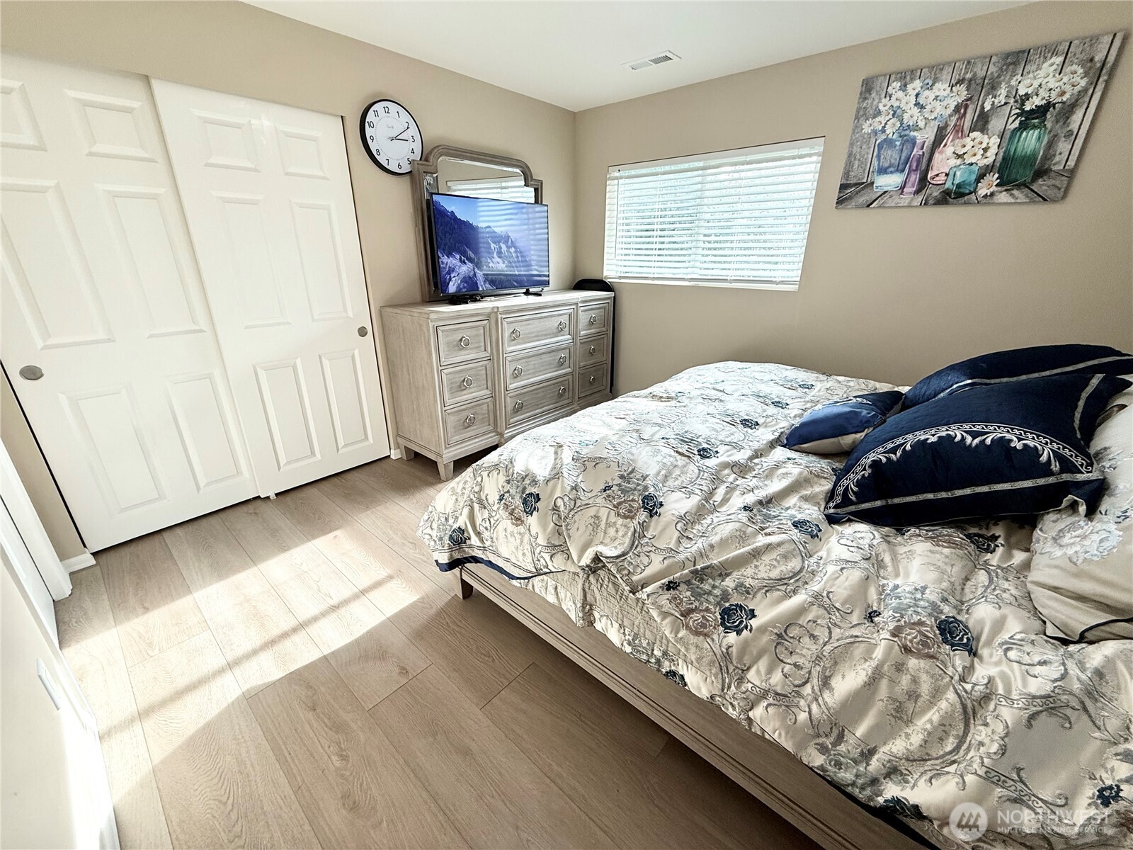 11049 18th Avenue Southwest Seattle, WA 98146 - Photo 18 of 40 a bedroom with bed and window